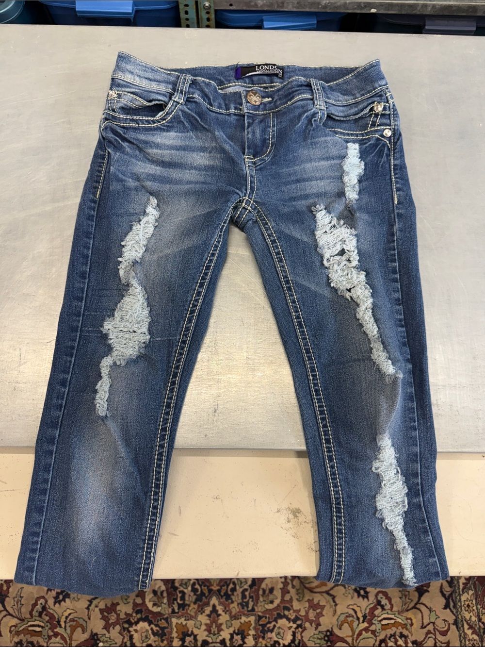 LONDONJEAN Distressed Blue Women's Jeggings with Light Rips